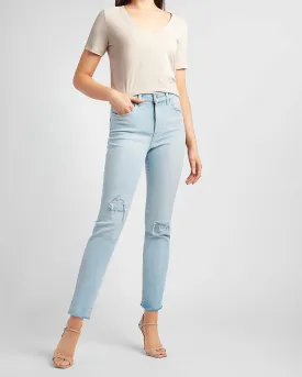 High Waisted Ripped Raw Hem Slim Jeans in Light Wash