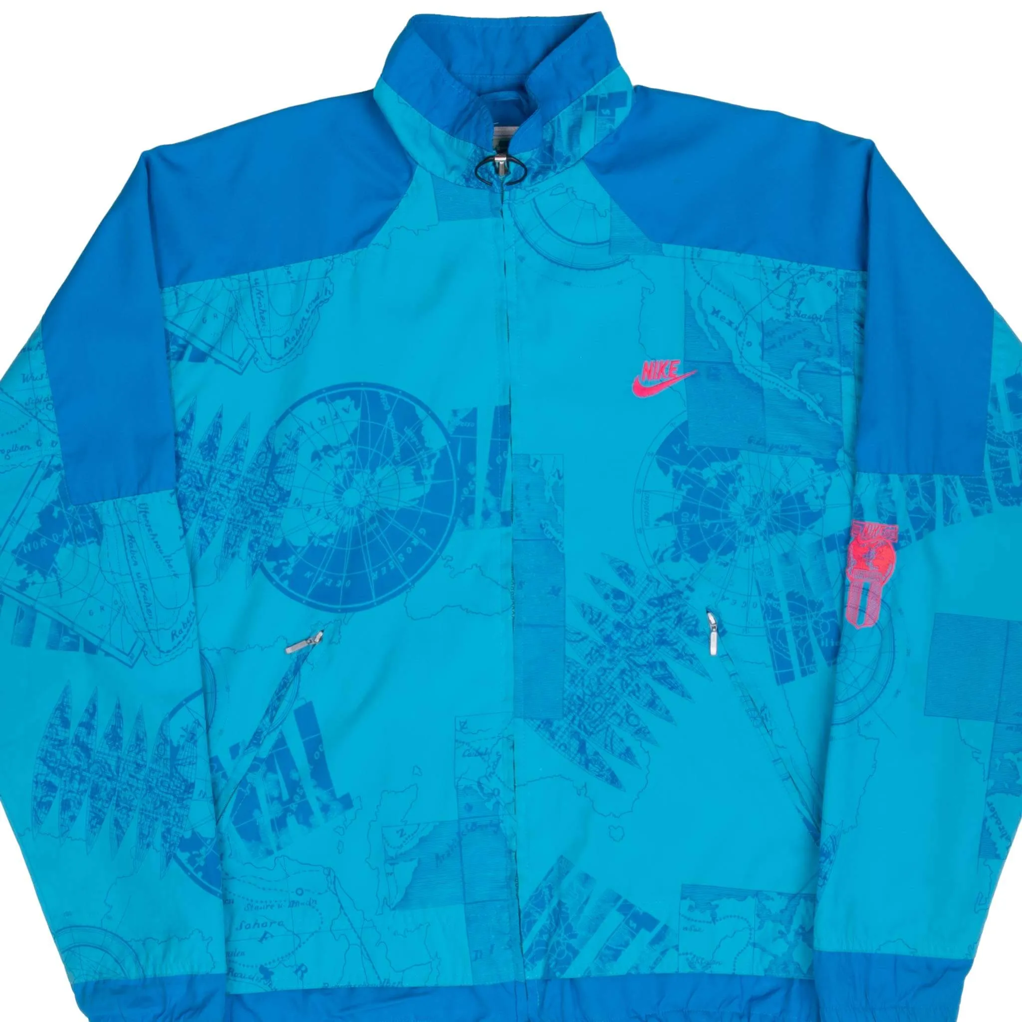 VINTAGE NIKE INTERNATIONAL ALL OVER PRINT BLUE WINDBREAKER JACKET 1990S MEDIUM