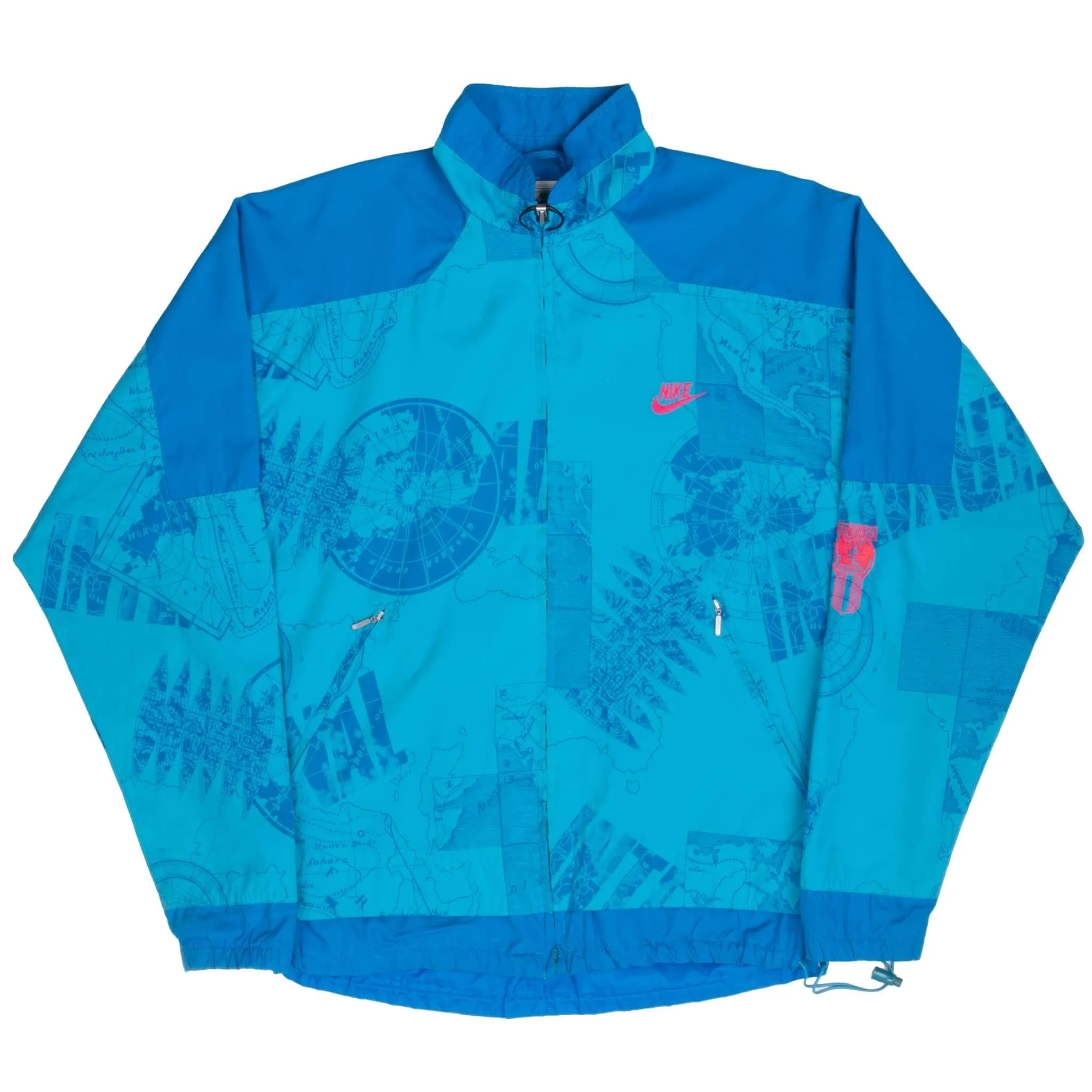 VINTAGE NIKE INTERNATIONAL ALL OVER PRINT BLUE WINDBREAKER JACKET 1990S MEDIUM